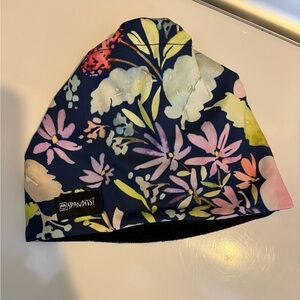Spandits! Fleece lined floral printed hat with opening for ponytail.